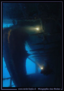 My wife discouvering the "Farud" Wreck in the waters of M... by Michel Lonfat 